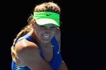 MELBOURNE, AUSTRALIA - JANUARY 26:  Victoria Azarenka of Belarus plays a backhand in her semifinal match against Kim Clijsters of Belgium during day eleven of the 2012 Australian Open at Melbourne Park on January 26, 2012 in Melbourne, Australia.  (Photo by Clive Brunskill/Getty Images)