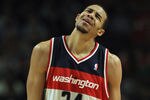 CHICAGO, IL - JANUARY 11:  JaVale McGee #34 of the Washington Wizards reacts after being called for a foul against the Chicago Bulls at the United Center on January 11, 2012 in Chicago, Illinois. The Bulls defeated the Wizards 78-64. NOTE TO USER: User expressly acknowledges and agrees that, by downloading and or using this photograph, User is consenting to the terms and conditions of the Getty Images License Agreement.  (Photo by Jonathan Daniel/Getty Images)
