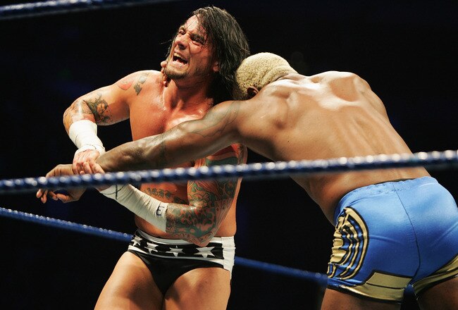 SYDNEY, AUSTRALIA - JUNE 15:  CM Punk wrestles Shelton Benjamin during WWE Smackdown at Acer Arena on June 15, 2008 in Sydney, Australia.  (Photo by Gaye Gerard/Getty Images)