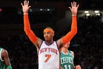 NEW YORK, NY - DECEMBER 25: Carmelo Anthony #7 of the New York Knicks reacts to the game action during the second half against the Boston Celtics at Madison Square Garden on December 25, 2011 in New York City. NOTE TO USER: User expressly acknowledges and agrees that, by downloading and or using this photograph, User is consenting to the terms and conditions of the Getty Images License Agreement. (Photo by Christopher Pasatieri/Getty Images)