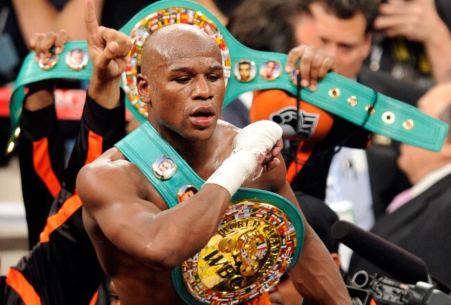 LAS VEGAS, NV - SEPTEMBER 17:  Floyd Mayweather Jr. celebrates his fourth-round knockout of Victor Ortiz to win the WBC welterweight title September 17, 2011 in Las Vegas, Nevada.  (Photo by Ethan Miller/Getty Images)