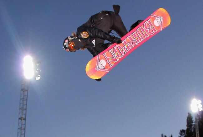 ASPEN, CO - JANUARY 30:  Shaun White of Carlsbad, California does a backside air above the halfpipe during practice before going on to win the gold medal in the Men's Snowboard Superpipe at Winter X Games 15 at Buttermilk Mountain on January 30, 2011 in Aspen, Colorado. White set a record in the event winning his fourth consecutive gold medal in as many years.  (Photo by Doug Pensinger/Getty Images)
