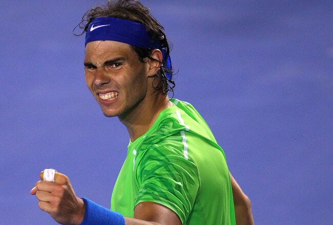 MELBOURNE, AUSTRALIA - JANUARY 26:  Rafael Nadal of Spain celebrates winning his semifinal match against Roger Federer of Switzerland during day eleven of the 2012 Australian Open at Melbourne Park on January 26, 2012 in Melbourne, Australia.  (Photo by Scott Barbour/Getty Images)
