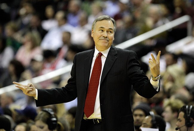 WASHINGTON, DC - JANUARY 06:  Head caoch Mike D'Antoni of the New York Knicks reacts to an officials call during the first half against the Washington Wizards at Verizon Center on January 6, 2012 in Washington, DC.  NOTE TO USER: User expressly acknowledges and agrees that, by downloading and or using this photograph, User is consenting to the terms and conditions of the Getty Images License Agreement.  (Photo by Rob Carr/Getty Images)