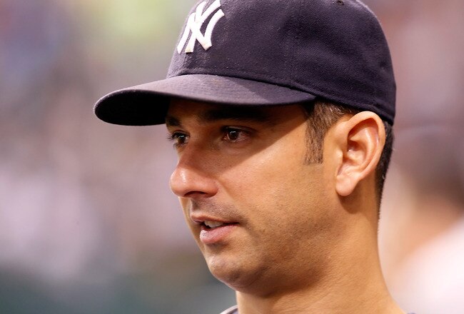 ST. PETERSBURG, FL - SEPTEMBER 28:  Jorge Posada #20 of the New York Yankees watches his team against the Tampa Bay Rays during the game at Tropicana Field on September 28, 2011 in St. Petersburg, Florida.  (Photo by J. Meric/Getty Images)