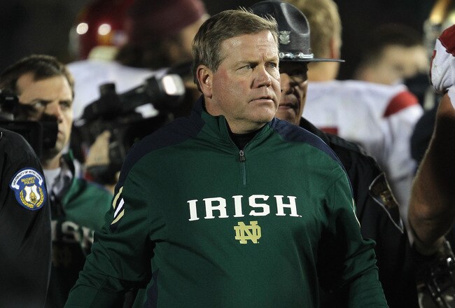 SOUTH BEND, IN - OCTOBER 22: Head coach Brian Kelly of the Notre Dame Fighting Irish leaves the field after a loss to the University of Southern California Trojans at Notre Dame Stadium on October 22, 2011 in South Bend, Indiana. USC defeated Notre Dame 31-17. (Photo by Jonathan Daniel/Getty Images)