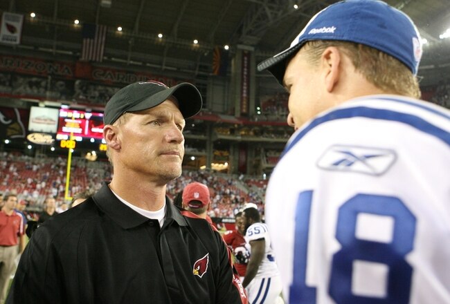 GLENDALE, AZ - SEPTEMBER 27:  Head coach Ken Whisenhunt of the Arizona Cardinals talks with quarterback Peyton Manning #18 of the Indianapolis Colts  after the Colts defeated the Cardinals 31-10 during the game at University of Phoenix Stadium on September 27, 2009 in Glendale, Arizona. (Photo by Christian Petersen/Getty Images)