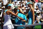 KEY BISCAYNE, FL - APRIL 02:  Victoria Azarenka of Belarus is congratulated by Maria Sharapova (R) of Russia after Azarenka won their women's singles championship at the Sony Ericsson Open at Crandon Park Tennis Center on April 2, 2011 in Key Biscayne, Florida.  (Photo by Clive Brunskill/Getty Images)