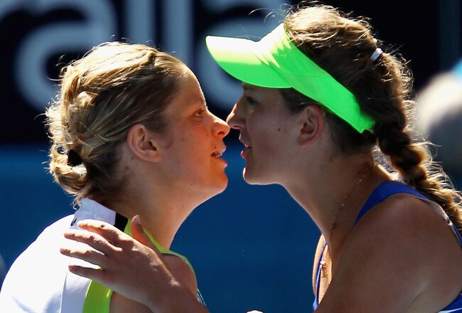 MELBOURNE, AUSTRALIA - JANUARY 26:  Victoria Azarenka of Belarus and Kim Clijsters of Belgium embrace at the net after their semifinal match during day eleven of the 2012 Australian Open at Melbourne Park on January 26, 2012 in Melbourne, Australia.  (Photo by Clive Brunskill/Getty Images)