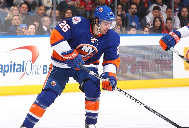 UNIONDALE, NY - JANUARY 10: Matt Moulson #26 of the New York Islanders in action against the Detroit Red Wings during their game on January10, 2012 at the Nassau Coliseum in Uniondale, New York.  (Photo by Al Bello/Getty Images)