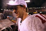 SAN FRANCISCO, CA - JANUARY 22:  Eli Manning #10 of the New York Giants walks off of the field after the Giants won 20-17 in overtime against the San Francisco 49ers during the NFC Championship Game at Candlestick Park on January 22, 2012 in San Francisco, California.  (Photo by Ezra Shaw/Getty Images)