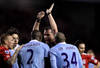 LIVERPOOL, ENGLAND - JANUARY 25:  Micah Richards of Manchester City protests to  Referee Phil Dowd after he awarded a penalty during the Carling Cup Semi Final Second Leg match between Liverpool and Manchester City at Anfield on January 25, 2012 in Liverpool, England.  (Photo by Alex Livesey/Getty Images)
