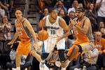 PHOENIX, AZ - DECEMBER 26:  Eric Gordon #10 of the New Orleans Hornets handles the ball during the season openning NBA game against the Phoenix Suns at US Airways Center on December 26, 2011 in Phoenix, Arizona.  The Hornets defeated the Suns 85-84. NOTE TO USER: User expressly acknowledges and agrees that, by downloading and or using this photograph, User is consenting to the terms and conditions of the Getty Images License Agreement.  (Photo by Christian Petersen/Getty Images)