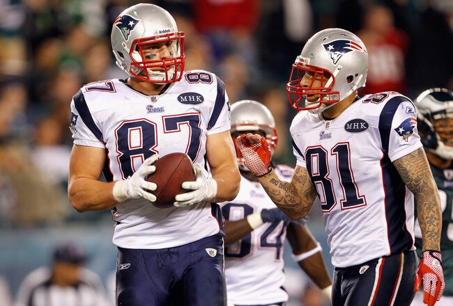 PHILADELPHIA, PA - NOVEMBER 27:  (L-R) Rob Gronkowski #87 and Aaron Hernandez #81 of the New England Patriots react after Gronkowski caught a 24-yard touchdown reception in the fourth quarter against the Philadelphia Eagles at Lincoln Financial Field on November 27, 2011 in Philadelphia, Pennsylvania.  (Photo by Rich Schultz/Getty Images)