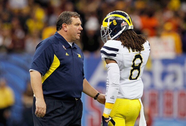 NEW ORLEANS, LA - JANUARY 03:  Head coach Brady Hoke of the Michigan Wolverines talks with J.T. Floyd #8 against the Virginia Tech Hokies during the Allstate Sugar Bowl at Mercedes-Benz Superdome on January 3, 2012 in New Orleans, Louisiana.  (Photo by Kevin C. Cox/Getty Images)