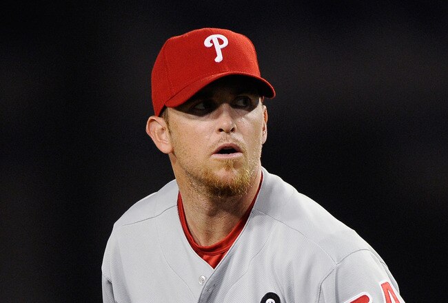 LOS ANGELES, CA - AUGUST 08:  Pitcher Brad Lidge #54 of the Philadelphia Phillies throws against the Los Angeles Dodgers at Dodger Stadium on August 8, 2011 in Los Angeles, California.  (Photo by Kevork Djansezian/Getty Images)