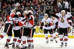 MONTREAL, CANADA - JANUARY 14:  Members of the Ottawa Senators celebrate the game winning goal by teammate Daniel Alfredsson #11 during the NHL game against the Montreal Canadiens at the Bell Centre on January 14, 2012 in Montreal, Quebec, Canada.  The Senators defeated the Canadiens 3-2 in a shootout.  (Photo by Richard Wolowicz/Getty Images)