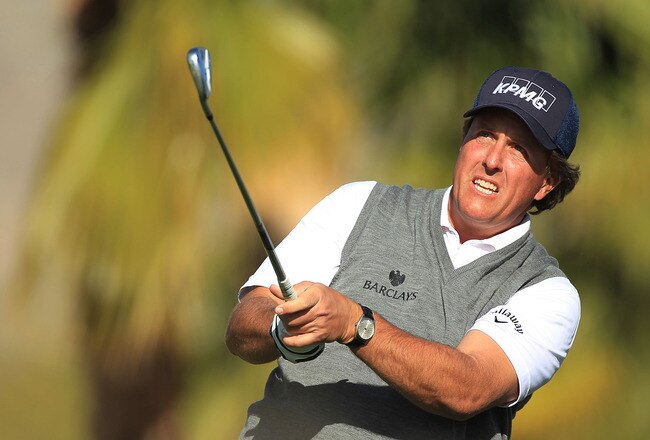 LA QUINTA, CA - JANUARY 20:  Phil Mickelson watches his tee shot on the 11th hole during the second round of the Humana Challenge In Partnership With the Clinton Foundation on the Nicklaus Private Course at PGA West on January 20, 2012 in La Quinta, California.  (Photo by Scott Halleran/Getty Images)