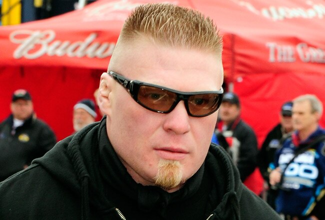 DAYTONA BEACH, FL - FEBRUARY 13:  MMA fighter Brock Lesnar walks in the garage area during practice for the Daytona 500 at Daytona International Speedway on February 13, 2010 in Daytona Beach, Florida.  (Photo by Sam Greenwood/Getty Images for NASCAR)