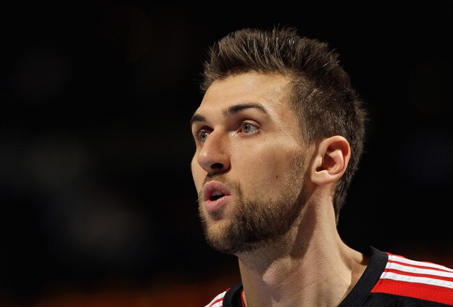 DENVER, CO - MARCH 21:  Andrea Bargnani #7 of the Toronto Raptors looks on during a break in the action against the Denver Nuggets at the Pepsi Center on March 21, 2011 in Denver, Colorado. The Nuggets defeated the Raptors 123-90. NOTE TO USER: User expressly acknowledges and agrees that, by downloading and or using this photograph, User is consenting to the terms and conditions of the Getty Images License Agreement.  (Photo by Doug Pensinger/Getty Images)