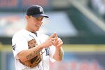DETROIT, MI - OCTOBER 12:  Brandon Inge #15 of the Detroit Tigers signals prior to Game Four of the American League Championship Series against the Texas Rangers at Comerica Park on October 12, 2011 in Detroit, Michigan.  (Photo by Harry How/Getty Images)