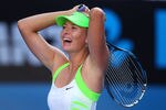 MELBOURNE, AUSTRALIA - JANUARY 26:  Maria Sharapova of Russia celebrates winning match point in her semifinal match against Petra Kvitova of the Czech Republic during day eleven of the 2012 Australian Open at Melbourne Park on January 26, 2012 in Melbourne, Australia.  (Photo by Cameron Spencer/Getty Images)