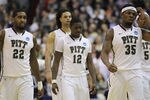 WASHINGTON - MARCH 19:  Members of the Pittsburgh basketball team including Nasir Robinson #35, Ashton Gibbs #12; and Brad Wanamaker#22 walk off the court following their loss against Butler in the third round of the 2011 NCAA men's basketball tournament at Verizon Center on March 19, 2011 in Washington, DC. Butler won the game 71-70.  (Photo by Nick Laham/Getty Images)