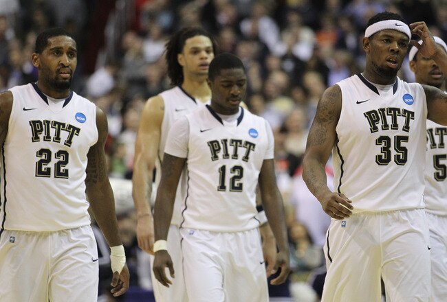 WASHINGTON - MARCH 19:  Members of the Pittsburgh basketball team including Nasir Robinson #35, Ashton Gibbs #12; and Brad Wanamaker#22 walk off the court following their loss against Butler in the third round of the 2011 NCAA men's basketball tournament at Verizon Center on March 19, 2011 in Washington, DC. Butler won the game 71-70.  (Photo by Nick Laham/Getty Images)