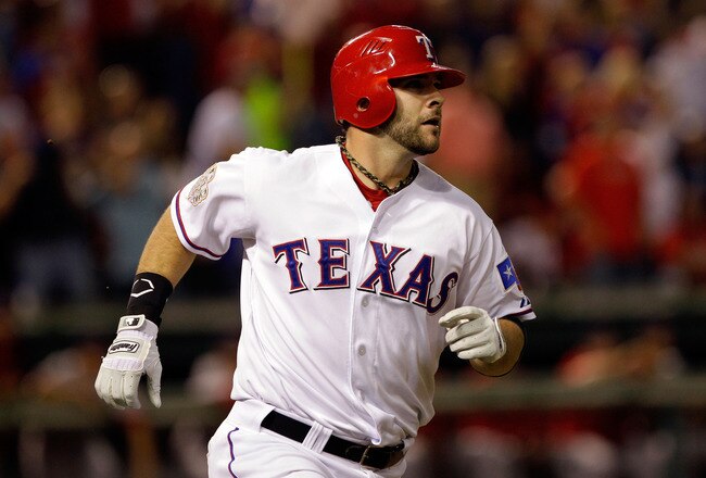 ARLINGTON, TX - OCTOBER 24:  Mitch Moreland #18 of the Texas Rangers watches the ball after hitting a solo home run in the third inning during Game Five of the MLB World Series against the St. Louis Cardinals at Rangers Ballpark in Arlington on October 24, 2011 in Arlington, Texas.  (Photo by Rob Carr/Getty Images)