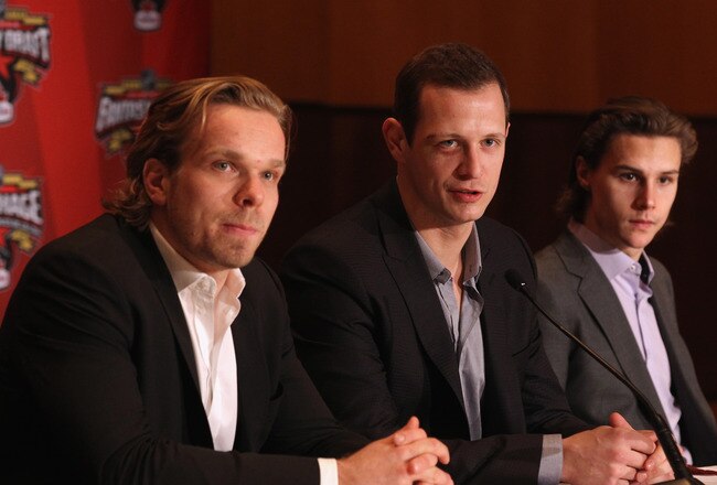 OTTAWA, ON - JANUARY 26:  (L-R) Milan Michalek, Jason Spezza and Erik Karlsson of the Ottawa Senators answer questions from the media during a media availabilty prior to the 2012 NHL All-Star Game Fantasy Draft at Hilton Lac Leamy on January 26, 2012 in Ottawa, Canada.  (Photo by Bruce Bennett/Getty Images)