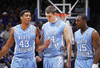 LEXINGTON, KY - DECEMBER 3: James Michael McAdoo #43, Tyler Zeller #44 and P.J. Hairston #15 of the North Carolina Tar Heels talk over strategy during the game against the Kentucky Wildcats at Rupp Arena on December 3, 2011 in Lexington, Kentucky. Kentucky won 73-72. (Photo by Joe Robbins/Getty Images)