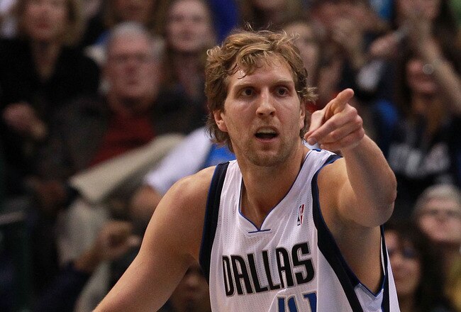 DALLAS, TX - JANUARY 04:  Dirk Nowitzki #41 of the Dallas Mavericks reacts after scoring against the Phoenix Suns at American Airlines Center on January 4, 2012 in Dallas, Texas. Nowitzki was playing in his 1,000 career game.  NOTE TO USER: User expressly acknowledges and agrees that, by downloading and/or using this Photograph, user is consenting to the terms and conditions of the Getty Images License Agreement.  (Photo by Ronald Martinez/Getty Images)
