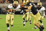 ORLANDO, FL - DECEMBER 29: Linebacker Nigel Bradham #13 of the Florida State Seminoles intercepts a pass in the fourth quarter  against the Notre Dame Fight Irish  December 29, 2011 at the Florida Citrus Bowl in Orlando, Florida.  FSU won 18 - 14.  (Photo by Al Messerschmidt/Getty Images)