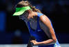 MELBOURNE, AUSTRALIA - JANUARY 26:  Victoria Azarenka of Belarus celebrates a point in her semifinal match against Kim Clijsters of Belgium during day eleven of the 2012 Australian Open at Melbourne Park on January 26, 2012 in Melbourne, Australia. (Photo by Martin Philbey-Pool/Getty Images)