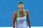 MELBOURNE, AUSTRALIA - JANUARY 26:  Maria Sharapova of Russia celebrates match point in her semifinal match against Petra Kvitova of the Czech Republic during day eleven of the 2012 Australian Open at Melbourne Park on January 26, 2012 in Melbourne, Australia.  (Photo by Ryan Pierse/Getty Images)
