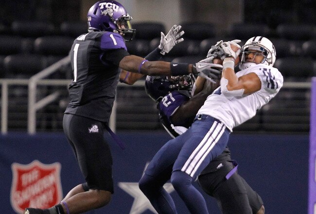 ARLINGTON, TX - OCTOBER 28:  Ross Apo #11 of the BYU Cougars catches a pass during a game against the TCU Horned Frogs at Cowboys Stadium on October 28, 2011 in Arlington, Texas.  (Photo by Sarah Glenn/Getty Images)