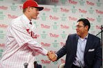 PHILADELPHIA, PA - NOVEMBER 14:  General Manager Rubin Amaro Jr. shakes the hand of Jonathan Papelbon of the Philadelphia Phillies as Papelbon signed a four-year, $50,000,058 contract, at Citizens Bank Park on November 14, 2011 in Philadelphia, Pennsylvania.  (Photo by Len Redkoles/Getty Images)