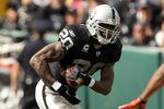 OAKLAND, CA - OCTOBER 16:  Darren McFadden #20 of the Oakland Raiders runs with the ball against the Cleveland Browns at O.co Coliseum on October 16, 2011 in Oakland, California.  (Photo by Ezra Shaw/Getty Images)