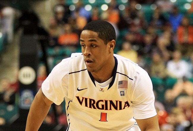 GREENSBORO, NC - MARCH 10:  Jontel Evans #1 of the Virginia Cavaliers drives the ball against the Miami Hurricanes during the first round of the 2011 ACC men's basketball tournament at the Greensboro Coliseum on March 10, 2011 in Greensboro, North Carolina. Miami won 69-62 in overtime. (Photo by Streeter Lecka/Getty Images)