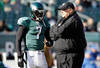 PHILADELPHIA, PA - JANUARY 01:  Michael Vick #7 of the Philadelphia Eagles talks with head coach Andy Reid before the start of the Eagles game against the Washington Redskins at Lincoln Financial Field on January 1, 2012 in Philadelphia, Pennsylvania.  (Photo by Rob Carr/Getty Images)