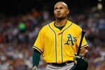 NEW YORK, NY - JUNE 22:  Coco Crisp #4 of the Oakland Athletics walk back to the dugout after striking out in the first inning against the New York Mets on June 22, 2011 at Citi Field in the Flushing neighborhood of the Queens borough of New York City.  (Photo by Mike Stobe/Getty Images)