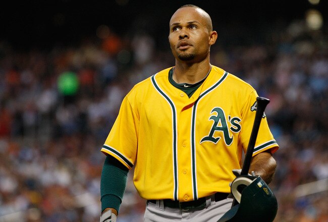 NEW YORK, NY - JUNE 22:  Coco Crisp #4 of the Oakland Athletics walk back to the dugout after striking out in the first inning against the New York Mets on June 22, 2011 at Citi Field in the Flushing neighborhood of the Queens borough of New York City.  (Photo by Mike Stobe/Getty Images)