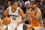 PHOENIX, AZ - DECEMBER 26:  Eric Gordon #10 of the New Orleans Hornets handles the ball during the season openning NBA game against the Phoenix Suns at US Airways Center on December 26, 2011 in Phoenix, Arizona.  The Hornets defeated the Suns 85-84. NOTE TO USER: User expressly acknowledges and agrees that, by downloading and or using this photograph, User is consenting to the terms and conditions of the Getty Images License Agreement.  (Photo by Christian Petersen/Getty Images)