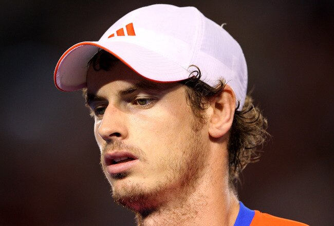 MELBOURNE, AUSTRALIA - JANUARY 27:  Andy Murray of Great Britain rests during a break in his semifinal match against Novak Djokovic of Serbia during day twelve of the 2012 Australian Open at Melbourne Park on January 27, 2012 in Melbourne, Australia.  (Photo by Cameron Spencer/Getty Images)