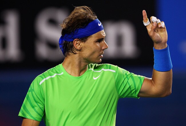 MELBOURNE, AUSTRALIA - JANUARY 26:  Rafael Nadal of Spain challenges a line call in his semifinal match against Roger Federer of Switzerland during day eleven of the 2012 Australian Open at Melbourne Park on January 26, 2012 in Melbourne, Australia.  (Photo by Clive Brunskill/Getty Images)
