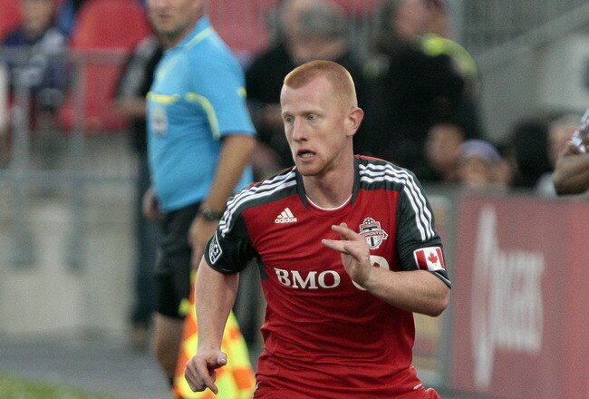 TORONTO, CANADA - AUGUST 27: Richard Eckersley #27 of Toronto FC carries the ball against San Jose Earthquakes during MLS action at BMO Field August 27, 2011 in Toronto, Ontario, Canada. (Photo by Abelimages/Getty Images)