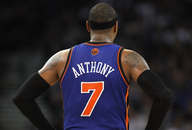 OAKLAND, CA - DECEMBER 28:  Carmelo Anthony #7 of the New York Knicks in action against the Golden State Warriors at Oracle Arena on December 28, 2011 in Oakland, California.  NOTE TO USER: User expressly acknowledges and agrees that, by downloading and or using this photograph, User is consenting to the terms and conditions of the Getty Images License Agreement.  (Photo by Ezra Shaw/Getty Images)
