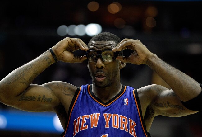 WASHINGTON, DC - JANUARY 06:  Amare Stoudemire #1 of the New York Knicks adjusts his goggles during the second half against the Washington Wizards at Verizon Center on January 6, 2012 in Washington, DC.  NOTE TO USER: User expressly acknowledges and agrees that, by downloading and or using this photograph, User is consenting to the terms and conditions of the Getty Images License Agreement.  (Photo by Rob Carr/Getty Images)