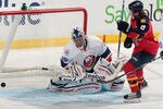 SUNRISE, FL - OCTOBER 22: Tim Kennedy #8 of the Florida Panthers scores a goal past goaltender Evgeni Nabokov #20 of the New York Islanders on October 22, 2011 at the BankAtlantic Center in Sunrise, Florida. The goal was the first as a Panther by Kennedy. (Photo by Joel Auerbach/Getty Images)