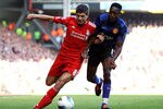 LIVERPOOL, ENGLAND - OCTOBER 15:  Steven Gerrard of Liverpool competes with Danny Welbeck of Manchester United during the Barclays Premier League match between Liverpool and Manchester United at Anfield on October 15, 2011 in Liverpool, England.  (Photo by Clive Brunskill/Getty Images)